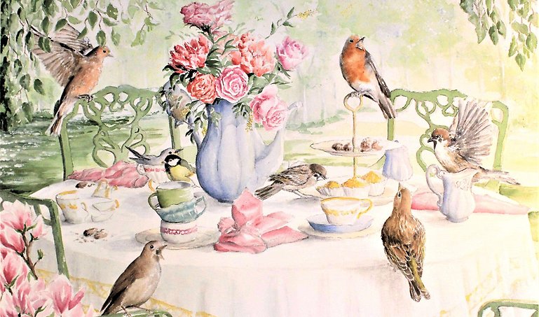 Målat bord dukat med fika, småfåglar sitter på bordet